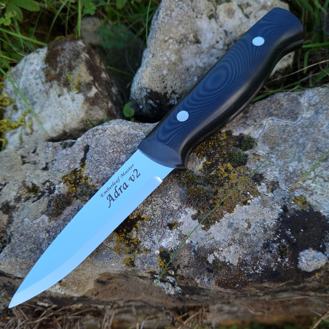 The Adra v2 master, its blade engraved Emberleaf Master