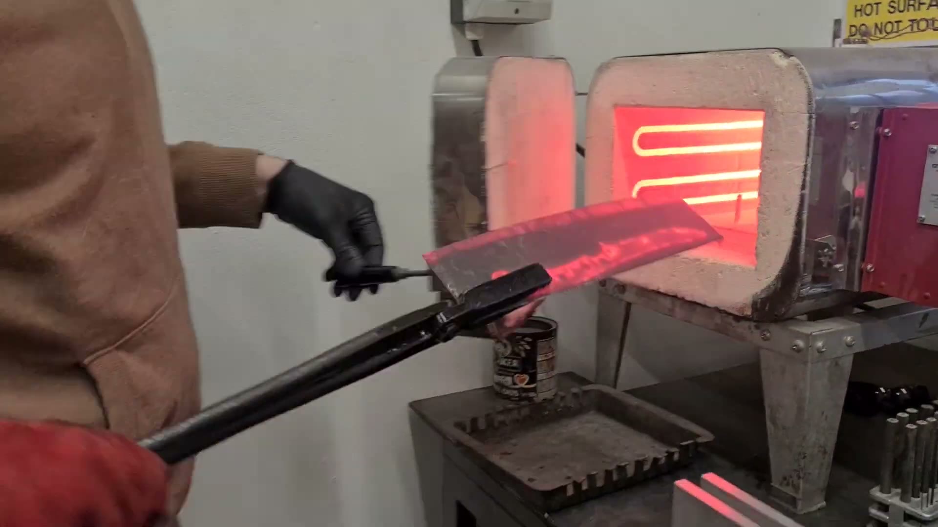 The heat-treat kiln glowing at temperature