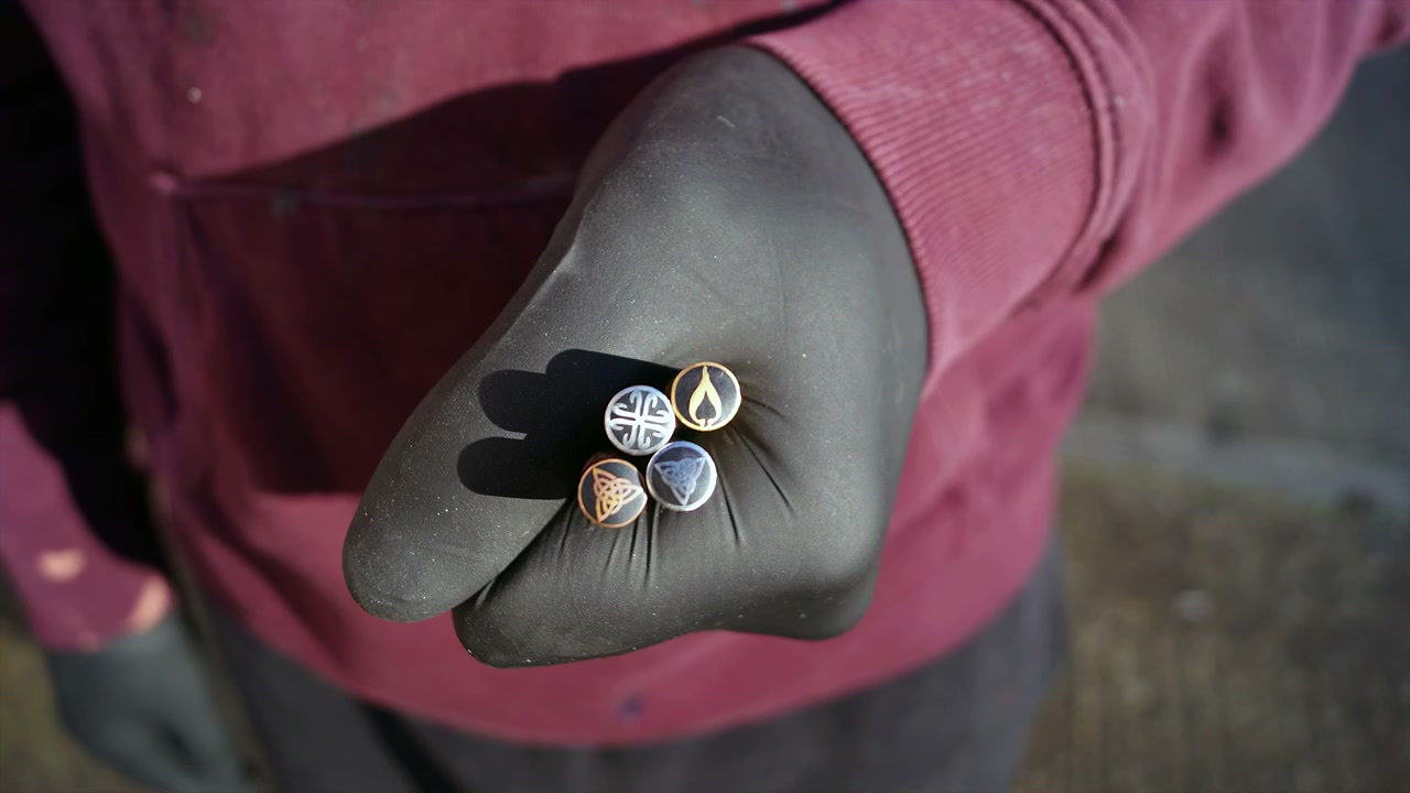 A handful of mosaic pins ready for handle assembly